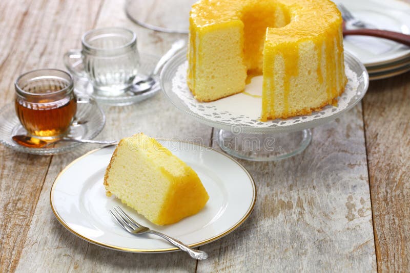 Homemade orange chiffon cake, close up. Homemade orange chiffon cake, close up